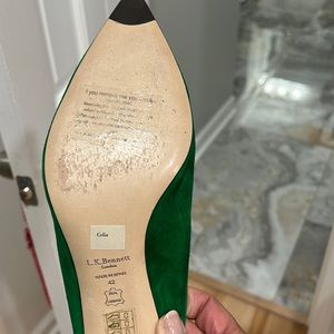 Suede kitten heel slip on shoe worn